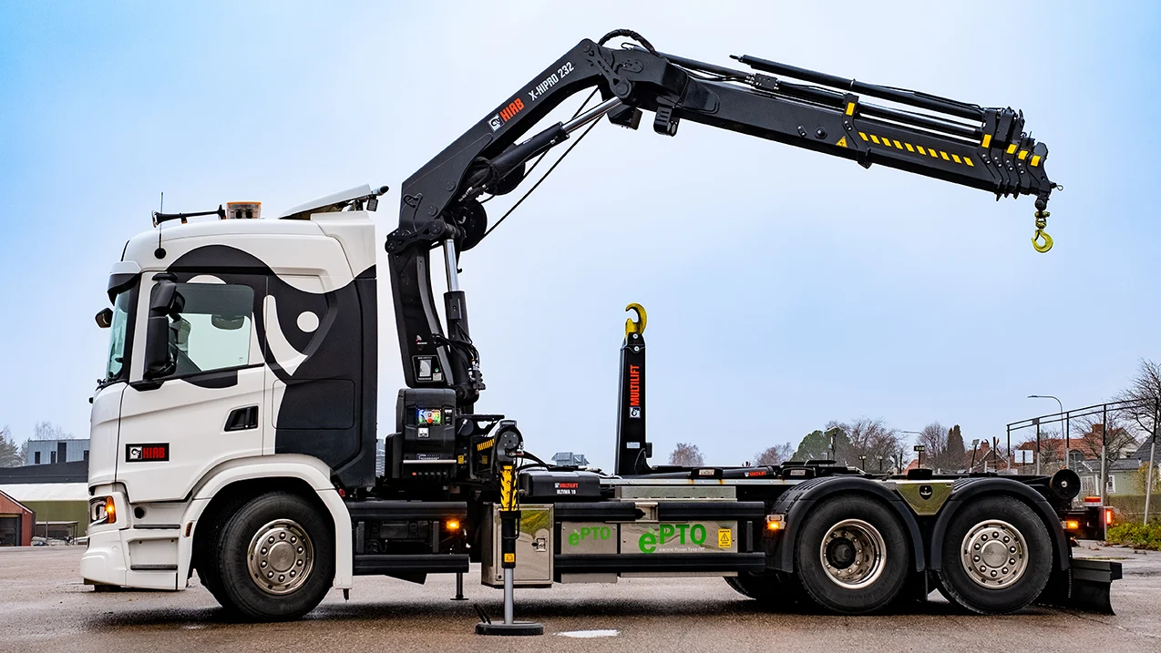 Loader crane unloading machinery and industrial equipment in Bracknell